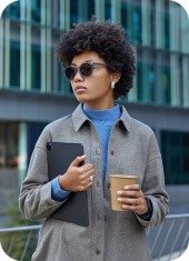 Girl stand with coffee